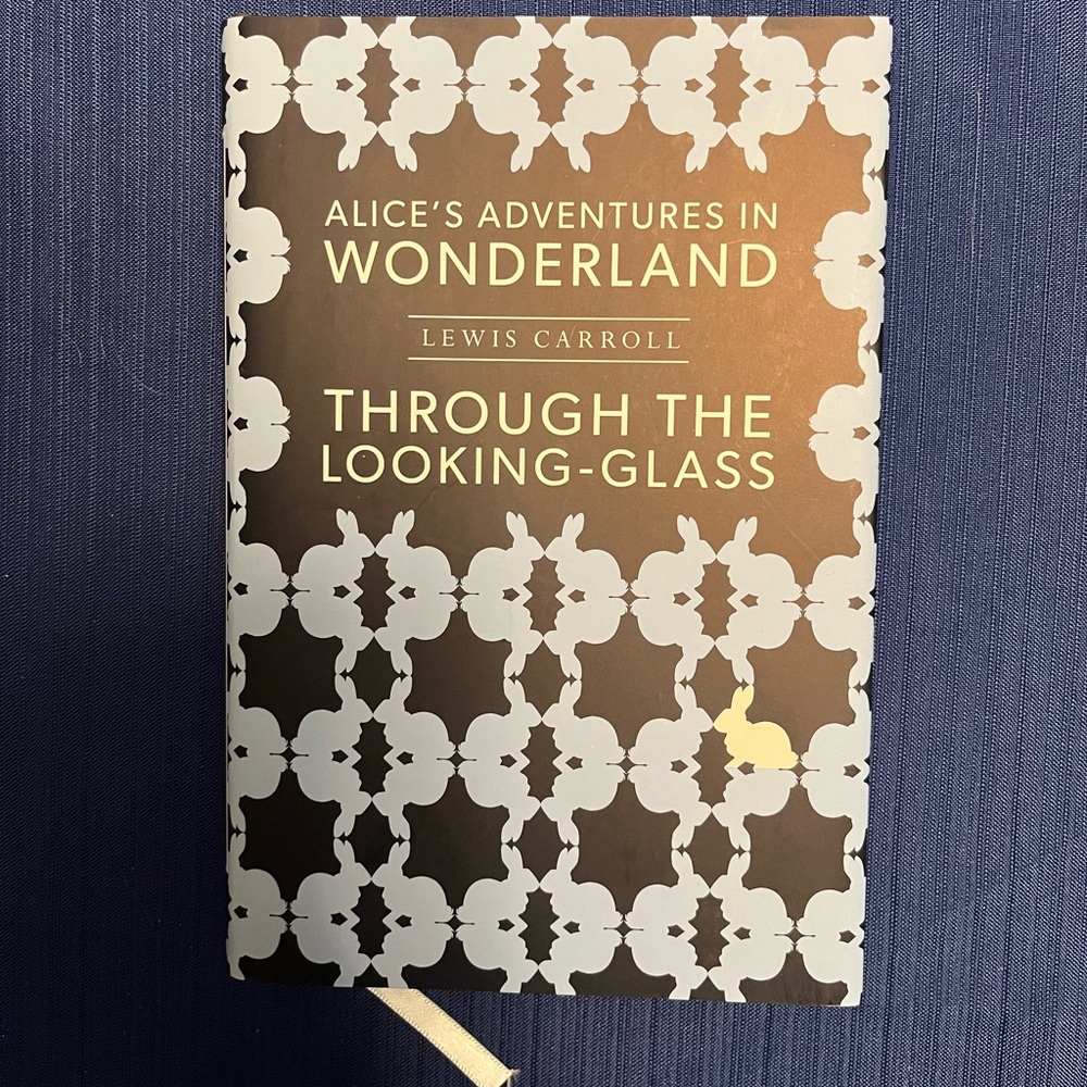 Hardcover copy of Alice’s Adventures in Wonderland by Lewis Carrol, book